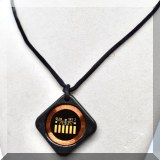 J138. Circuit board necklace on a cord. - $14 
